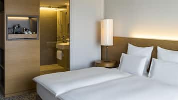 Ropa de cama de alta calidad y minibar