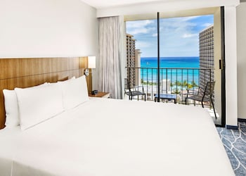 In-room safe, desk, blackout drapes, iron/ironing board at Hyatt Place Waikiki Beach