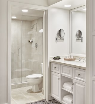 Combined shower/tub, free toiletries, hair dryer, towels at Arizona Grand Resort & Spa