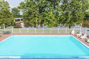 Seasonal outdoor pool, open 9 AM to 9 PM, pool loungers