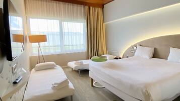 Suite Standard, plusieurs lits | Literie de qualité supérieure, rideaux occultants, chambres insonorisées