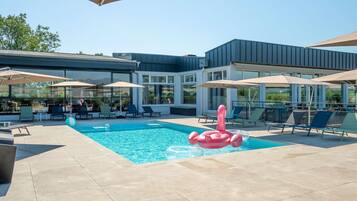 Seasonal outdoor pool, pool umbrellas, pool loungers