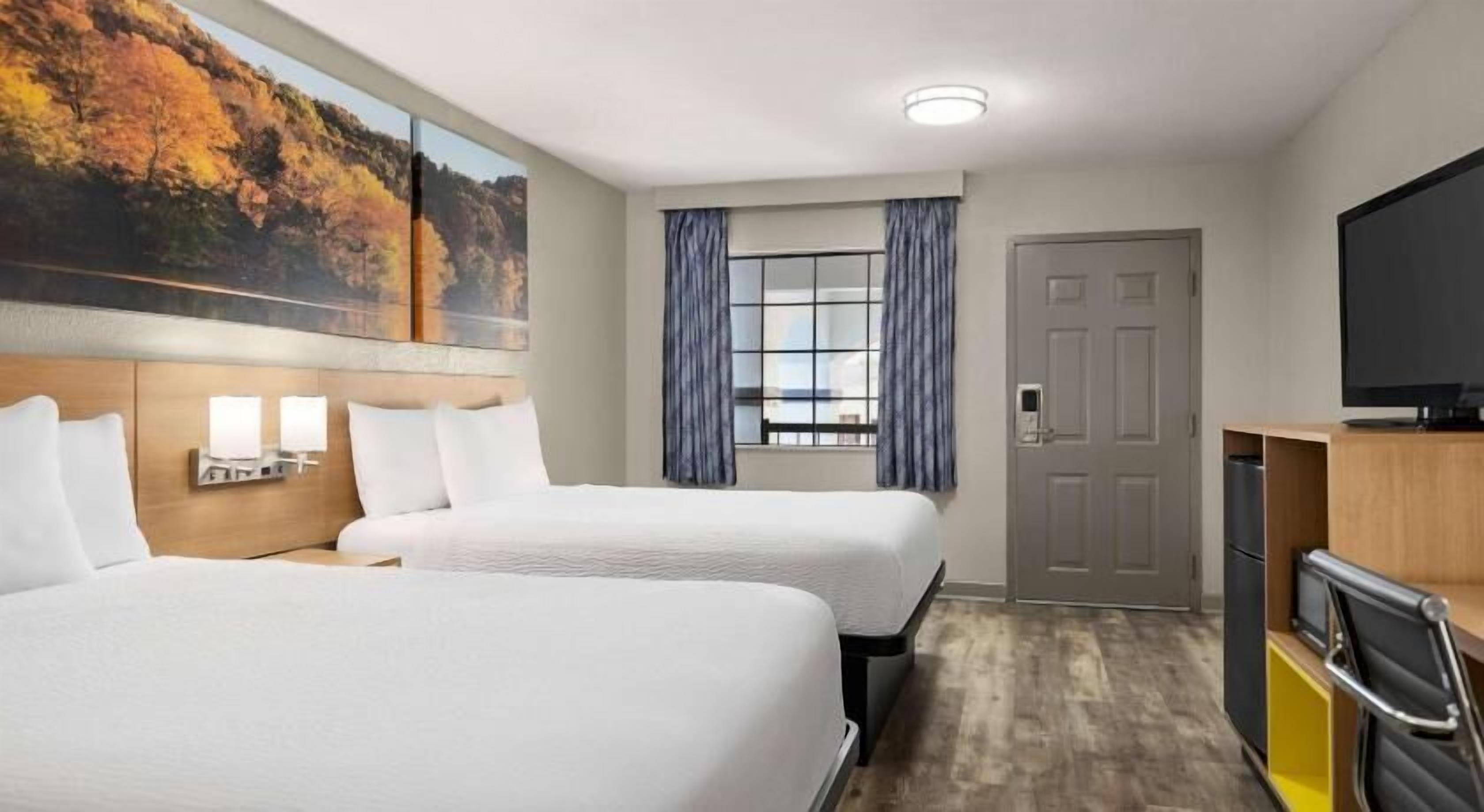 Desk, iron/ironing board, free cribs/infant beds, rollaway beds