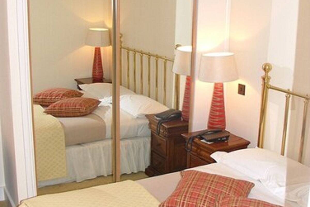 deluxe double room | desk, iron/ironing board, free cots/infant beds, free wifi