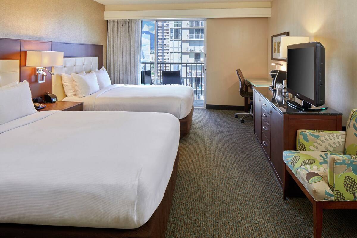 Premium bedding, down duvets, pillow-top beds, in-room safe