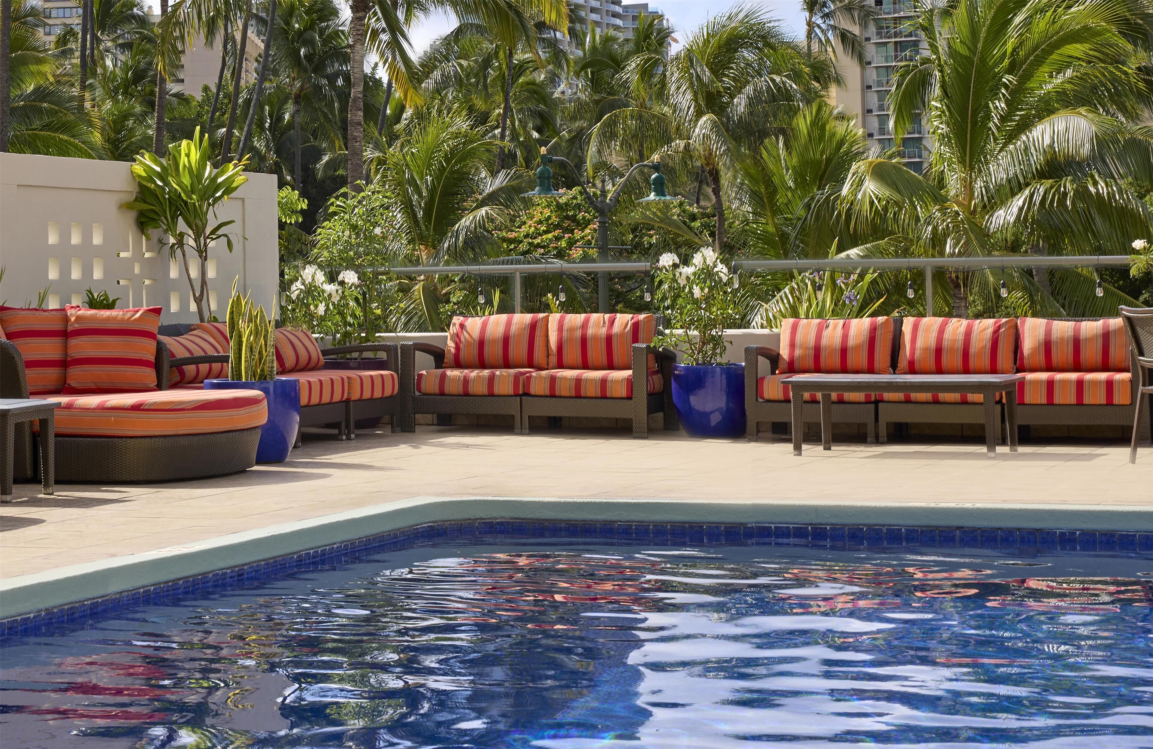 Outdoor pool, open 6 AM to 10 PM, pool umbrellas, sun loungers