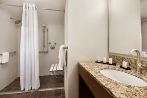 Combined shower/bathtub, deep-soaking bathtub, designer toiletries