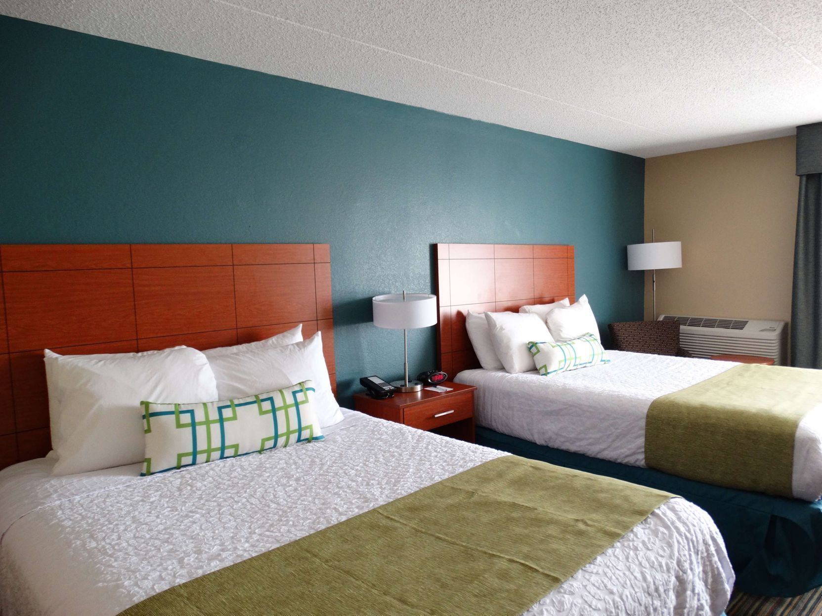 Premium bedding, pillowtop beds, desk, blackout drapes