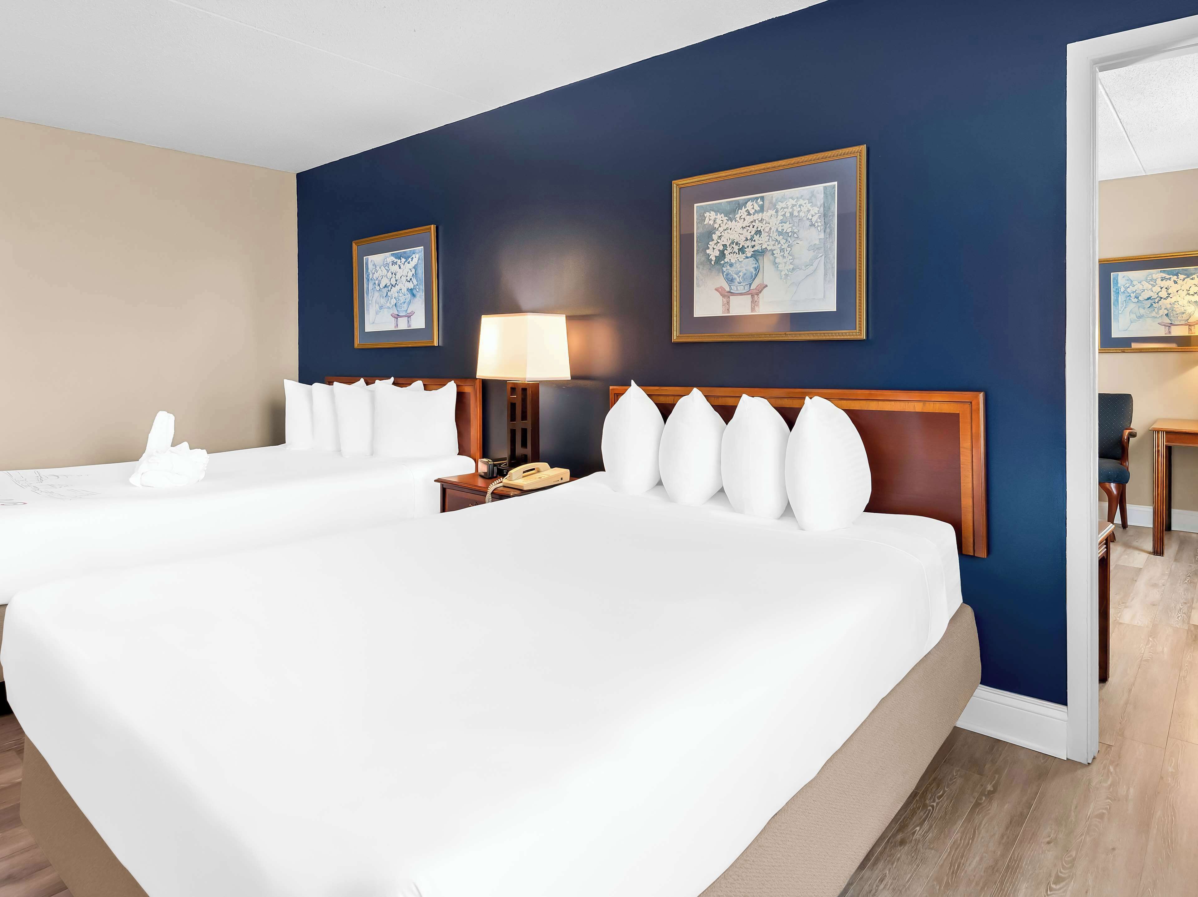 Suite, 2 Queen Beds, Non Smoking, Refrigerator (Larger Room) | In-room safe, desk, laptop workspace, blackout drapes