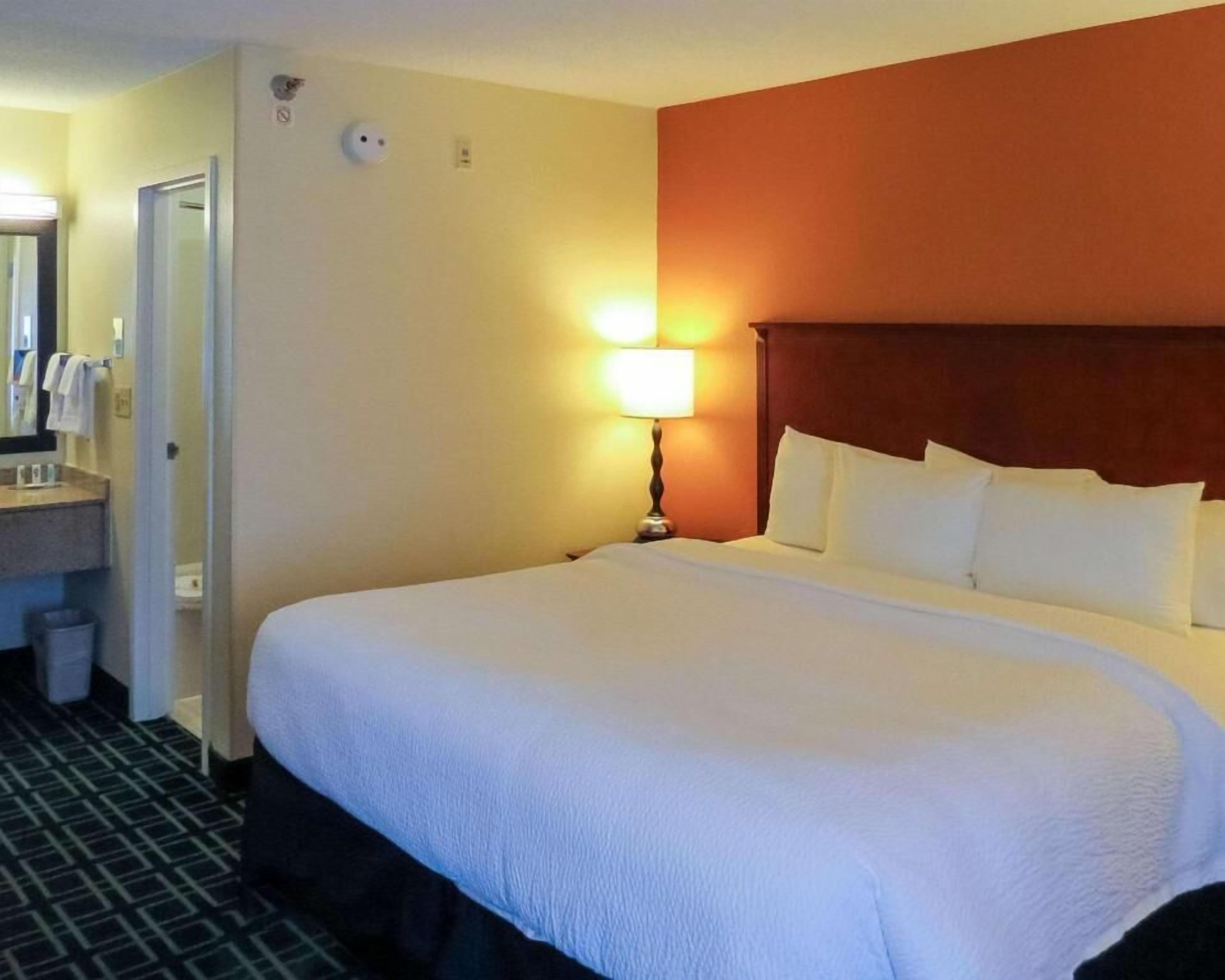 Hypo-allergenic bedding, pillowtop beds, desk, blackout drapes