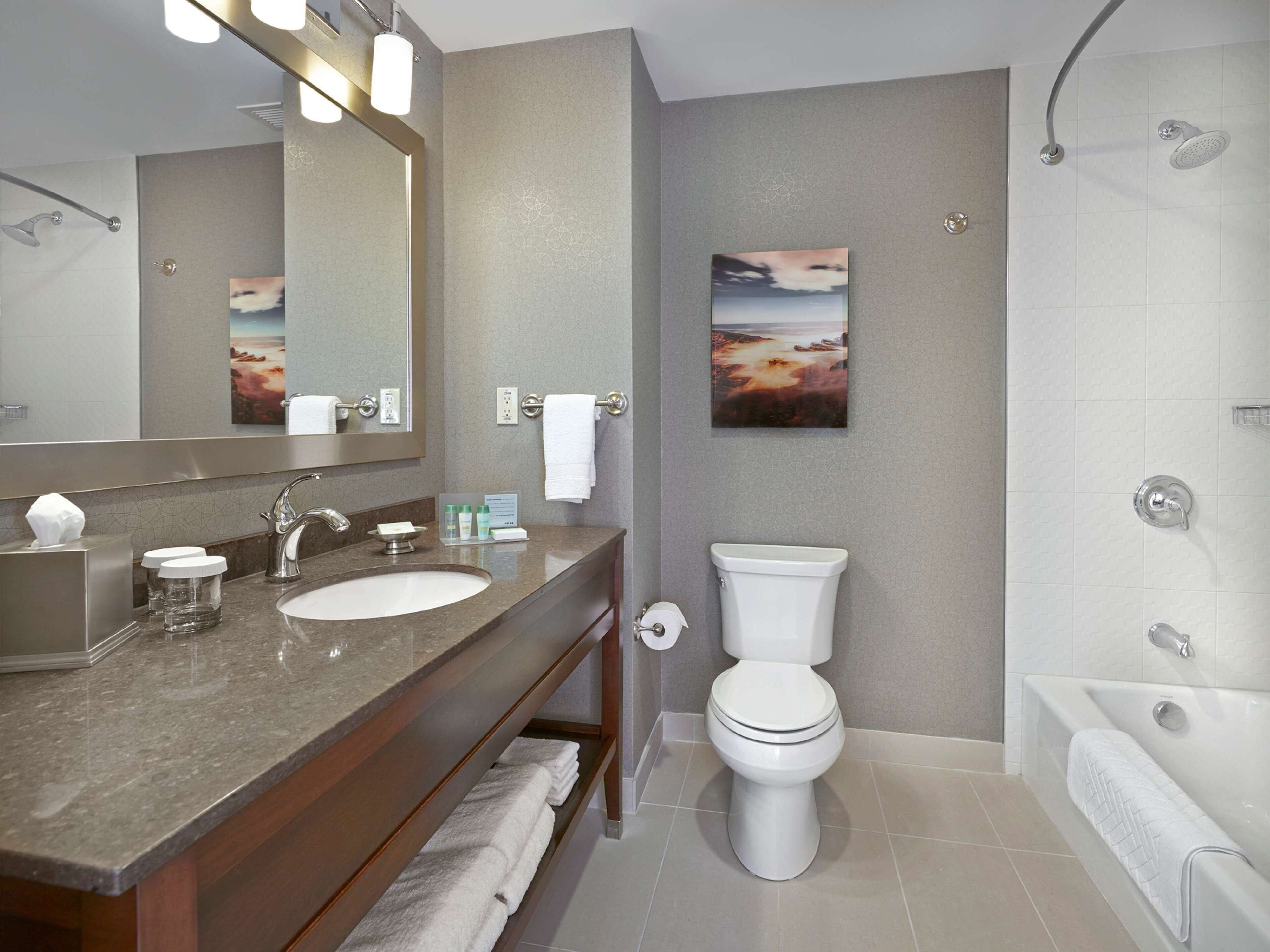 eco-friendly toiletries, hair dryer, towels