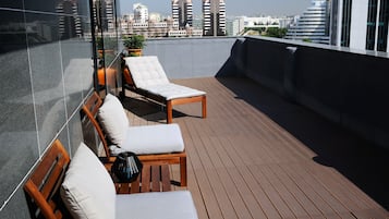 Family Suite, Terrace | Minibar, in-room safe, desk, blackout drapes