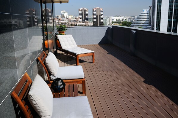 Family Suite, Terrace | Minibar, in-room safe, desk, blackout curtains