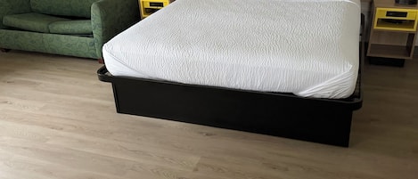 Desk, laptop workspace, blackout drapes, iron/ironing board