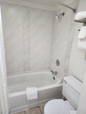 Deluxe Room, 2 Queen Beds, Refrigerator & Microwave | Bathroom | Combined shower/tub, towels
