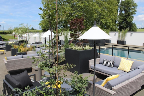 Outdoor pool, open 9:00 AM to 9:00 PM, sun loungers