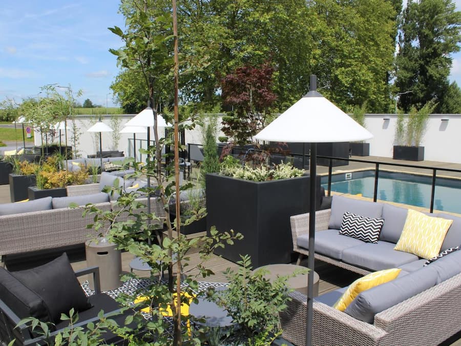 Outdoor pool, open 9:00 AM to 9:00 PM, sun loungers