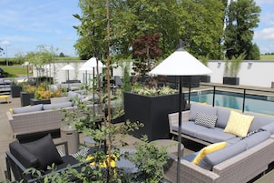 Outdoor pool, open 9:00 AM to 9:00 PM, sun loungers