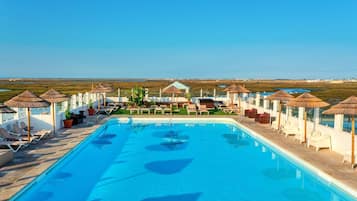 Seasonal outdoor pool, pool umbrellas