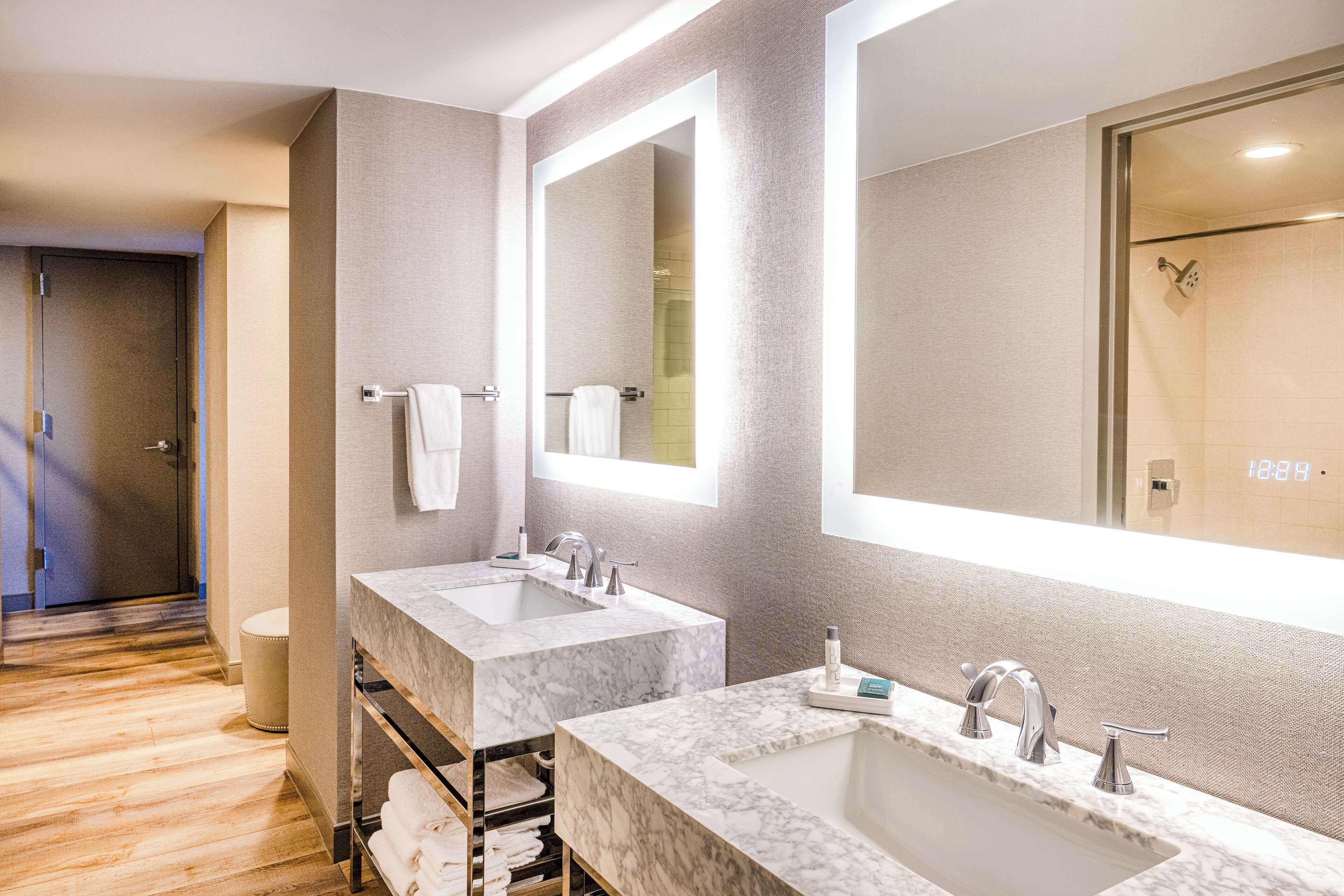 studio suite, 1 king bed | bathroom | designer toiletries, hair dryer, towels