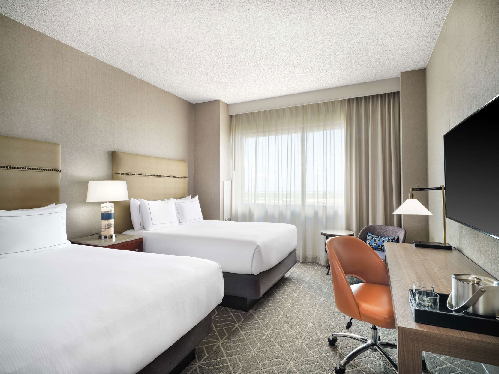 Premium bedding, pillowtop beds, in-room safe, desk