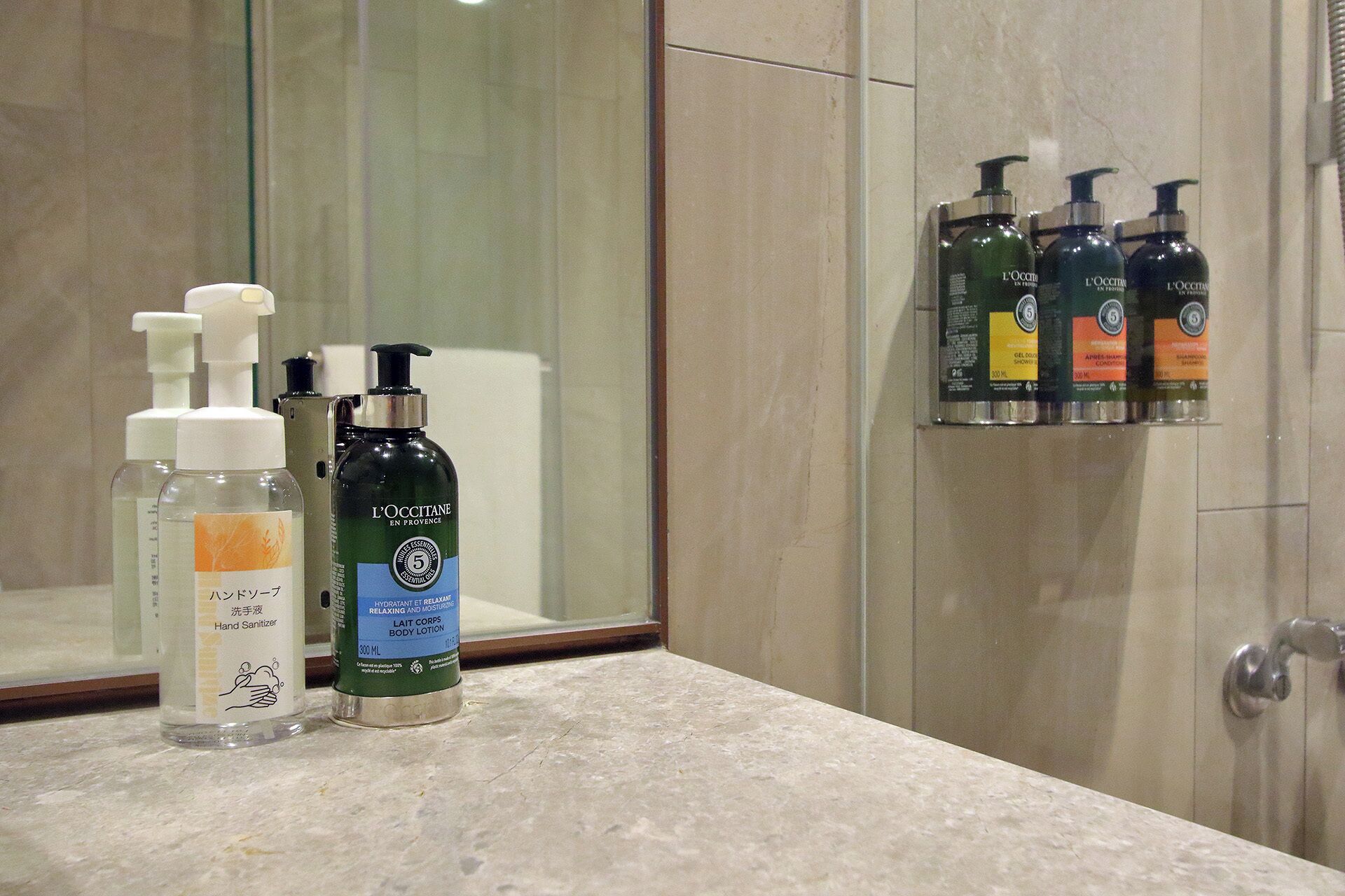 hair dryer, slippers, bidet, towels