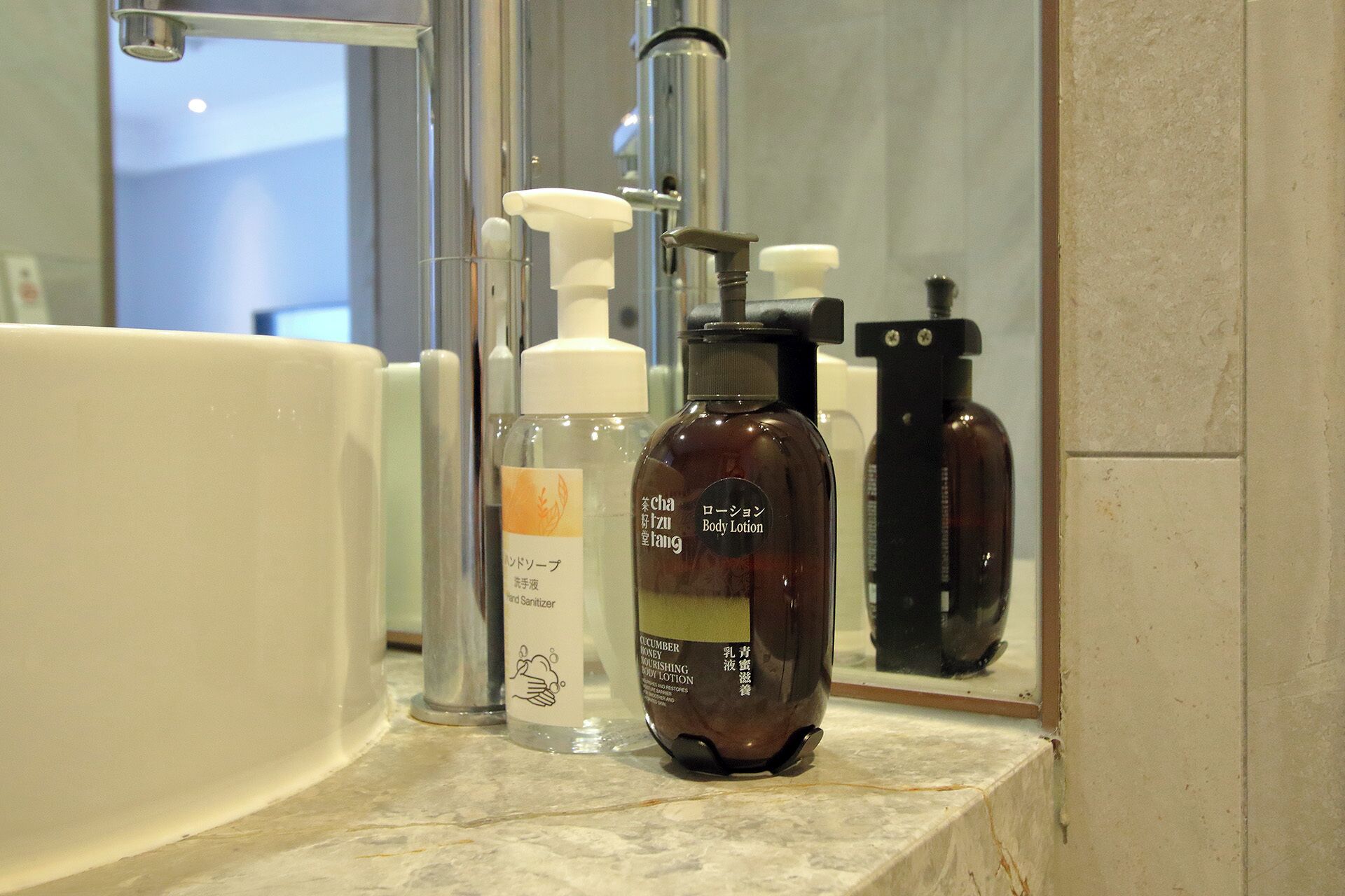 hair dryer, slippers, bidet, towels