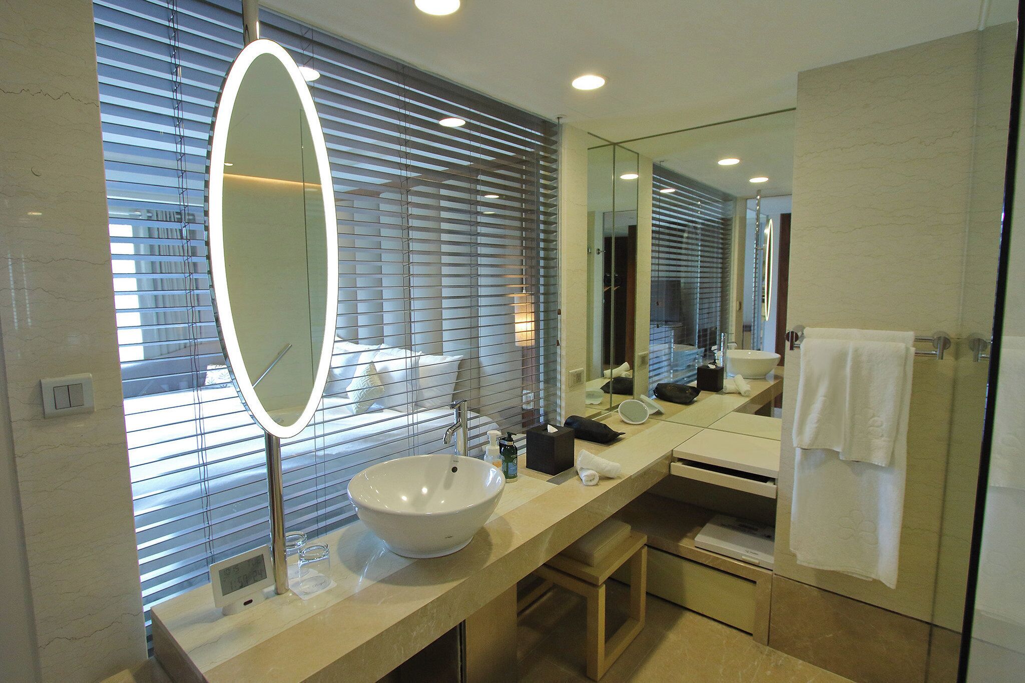 hair dryer, slippers, bidet, towels