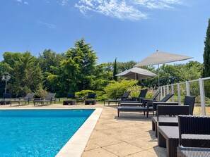 Seasonal outdoor pool, open 8 AM to 8:30 PM, pool loungers