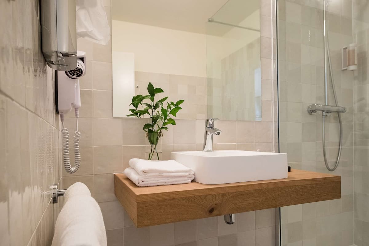 free toiletries, hair dryer, bidet, towels