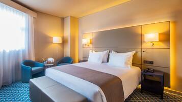 Hypo-allergenic bedding, minibar, in-room safe, desk