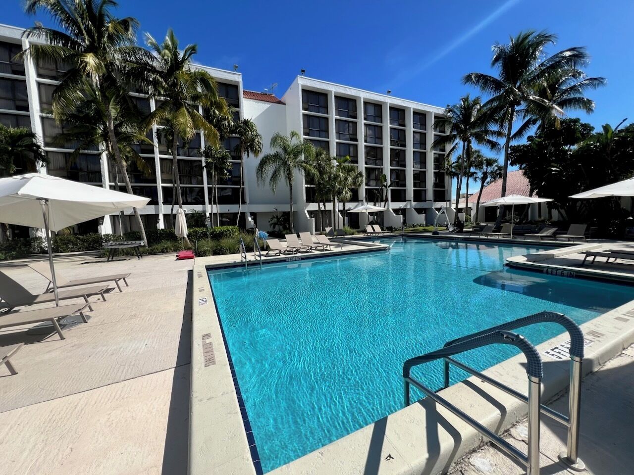 Outdoor pool, open 7:00 AM to 9:00 PM, pool umbrellas, sun loungers