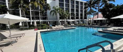 Outdoor pool, open 7:00 AM to 9:00 PM, pool umbrellas, sun loungers