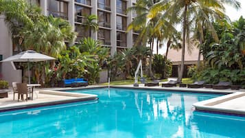Outdoor pool, open 7:00 AM to 9:00 PM, pool umbrellas, pool loungers