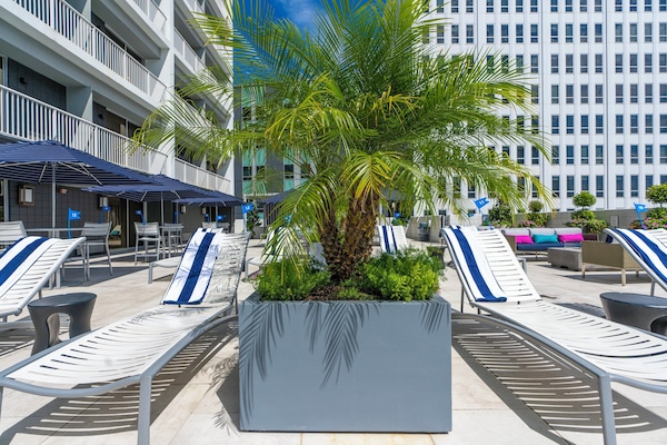 Outdoor pool, open 9:00 AM to 9:00 PM, free cabanas