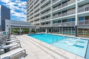 Outdoor pool, open 9:00 AM to 9:00 PM, free pool cabanas