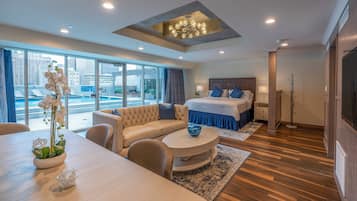 Suite, 1 cama King size | Ropa de cama de alta calidad y caja de seguridad en la habitación