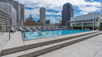 Outdoor pool, open 9:00 AM to 9:00 PM, free cabanas