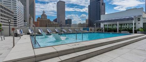 Outdoor pool, open 9:00 AM to 9:00 PM, free pool cabanas