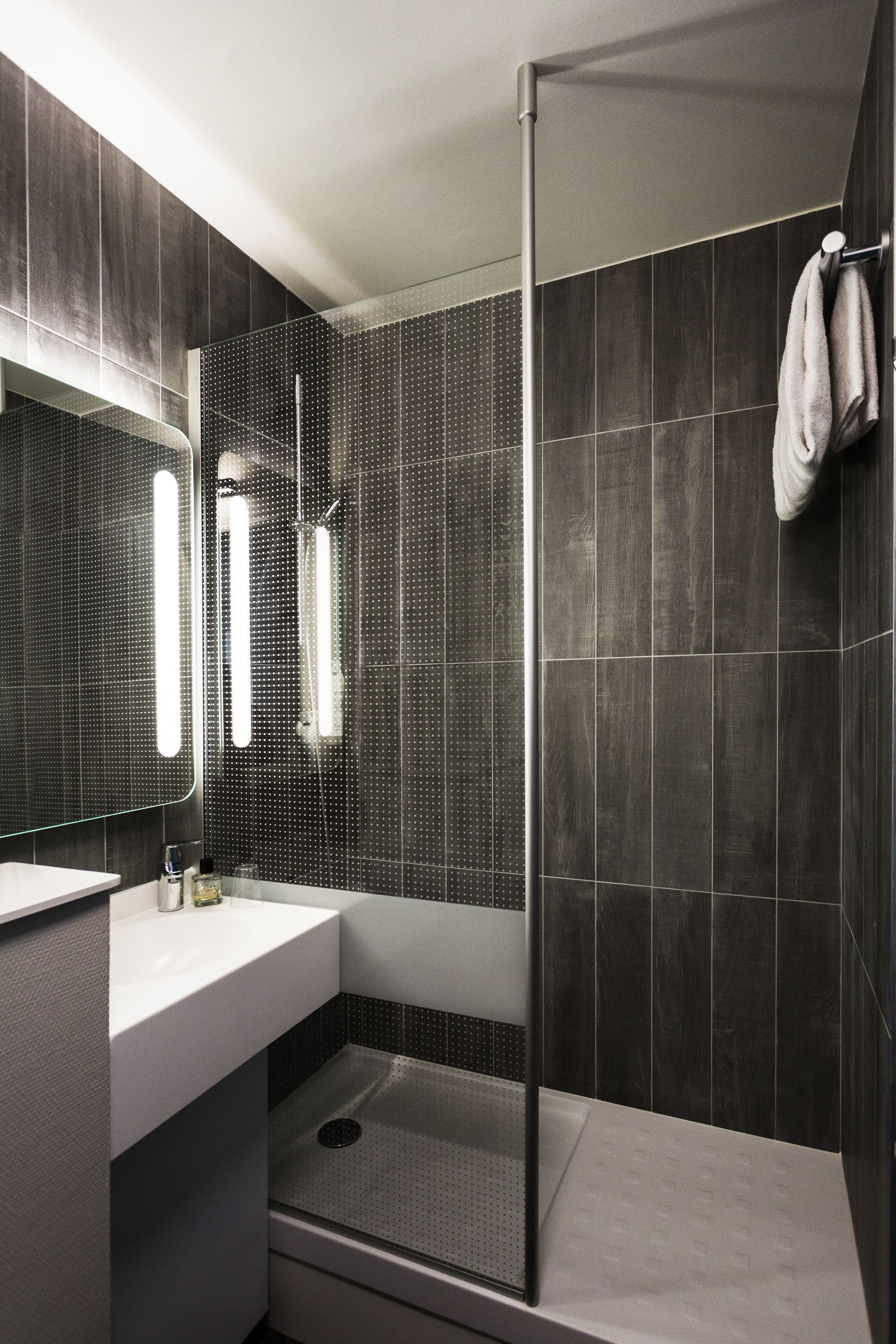 shower, eco-friendly toiletries, hair dryer, towels