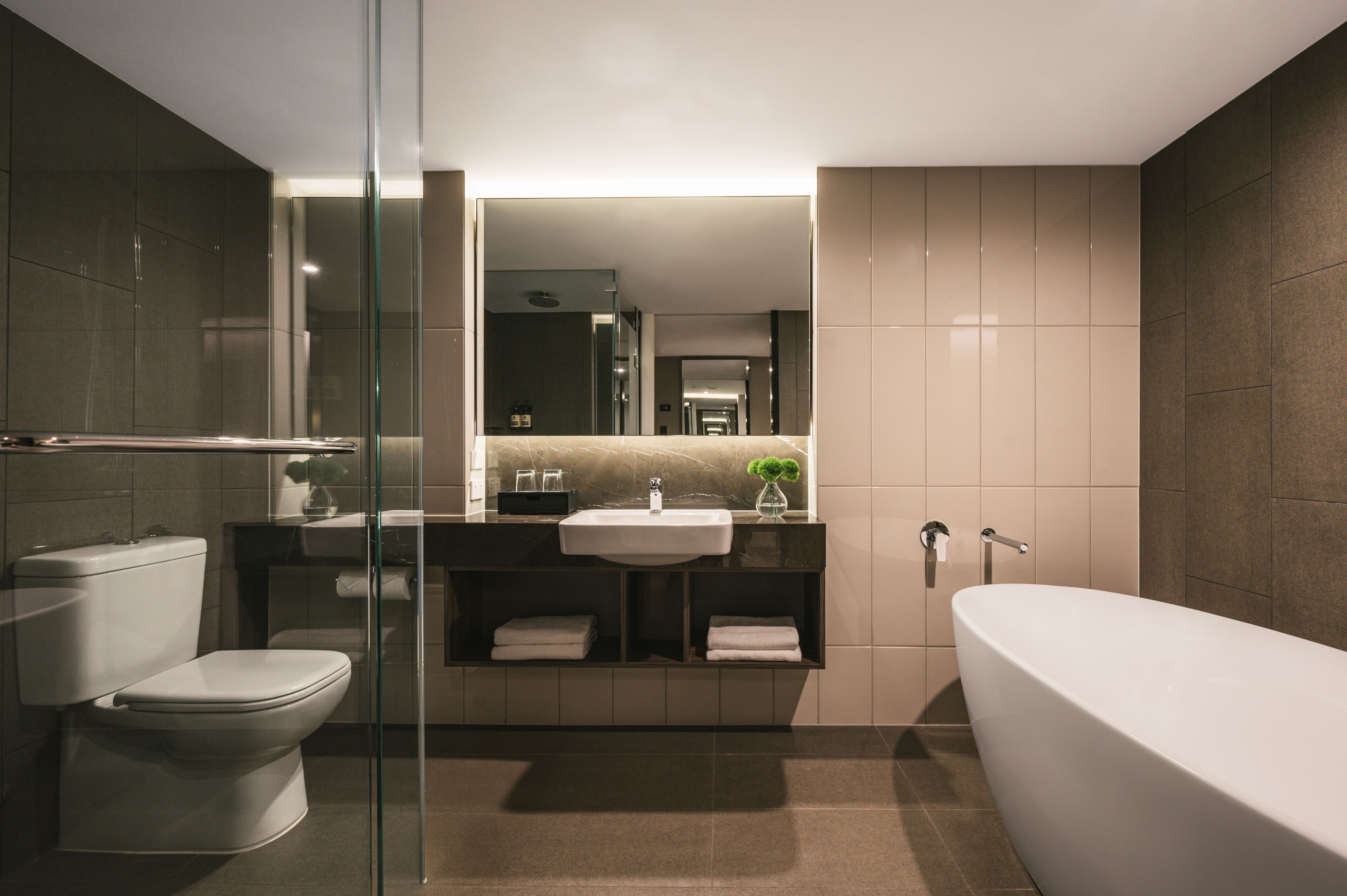premier king corner room | bathroom | shower, free toiletries, hair dryer, bathrobes