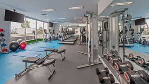 A gym with treadmills, weight machines, and free weights. - PARKROYAL Parramatta (Parramatta)