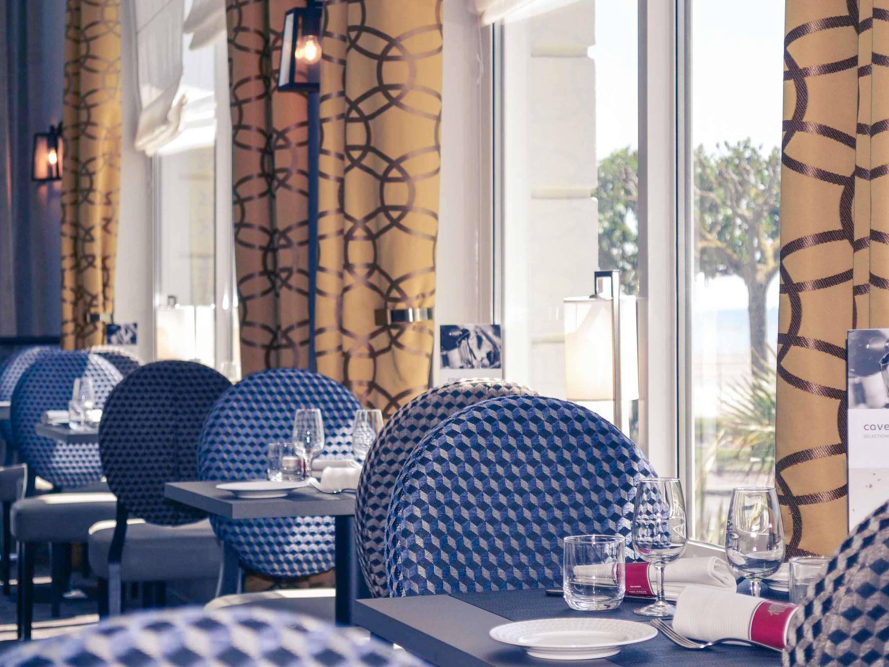 Lunch, dinner served; French cuisine, beach views 