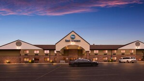 A Best Western hotel with a brick facade, a central entrance, and a parking lot. - Best Western Kendallville Inn (Kendallville)