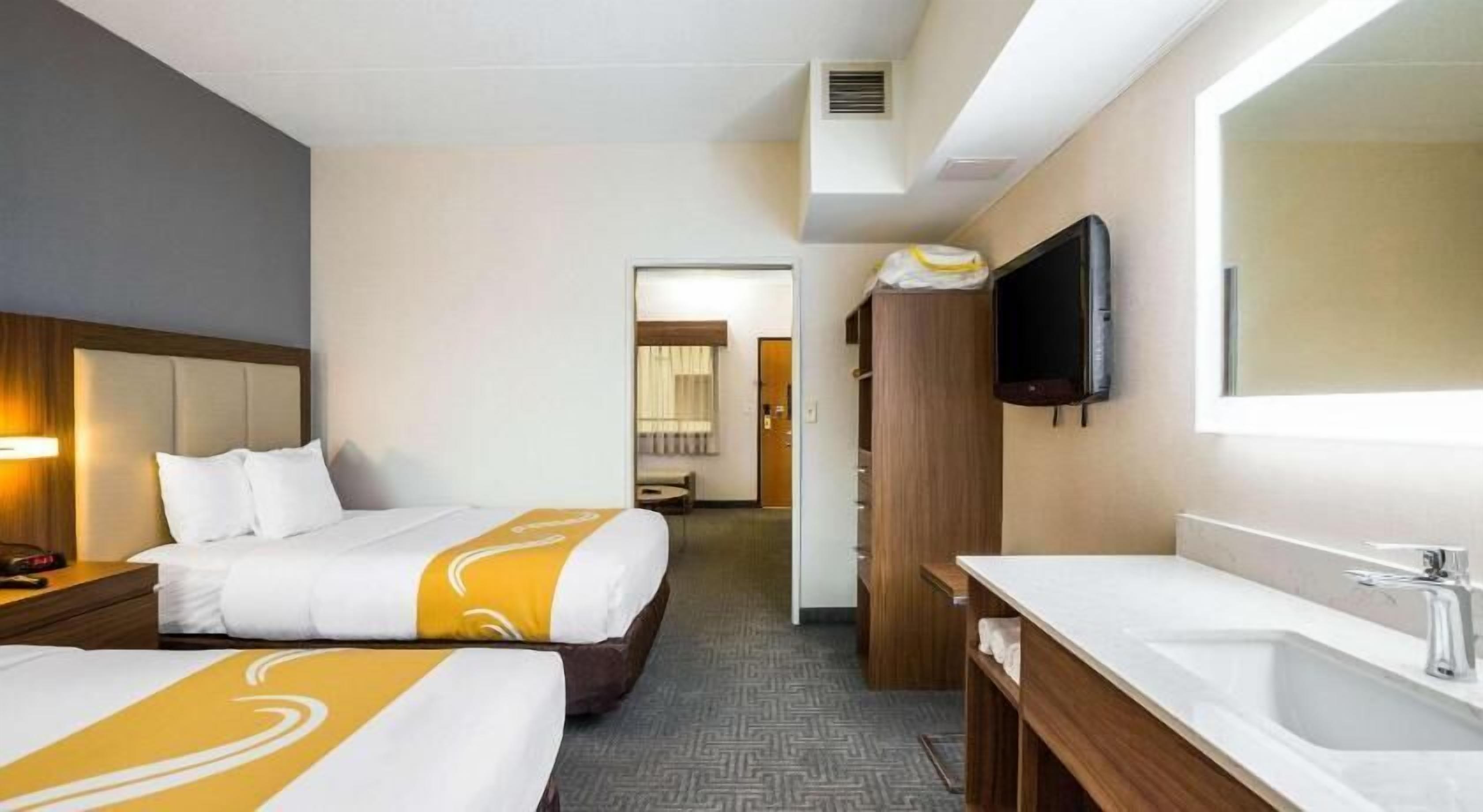 Desk, laptop workspace, iron/ironing board, rollaway beds