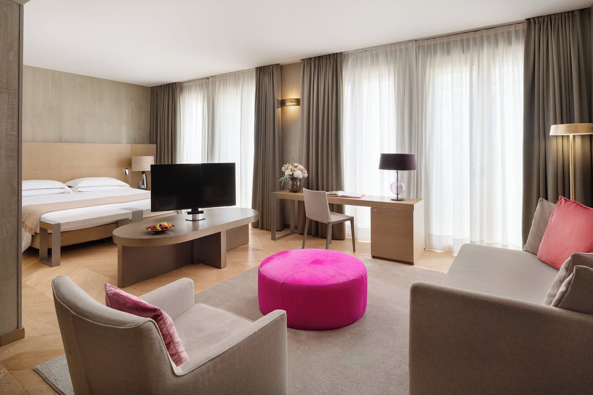 Suíte júnior | 2 quartos, roupas de cama premium, frigobar, cofres nos quartos