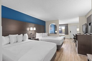 Suite, Multiple Beds, Non Smoking | In-room safe, desk, blackout drapes, iron/ironing board