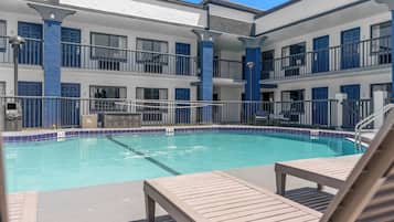 Outdoor pool, open 8:00 AM to 7:00 PM, pool umbrellas, sun loungers