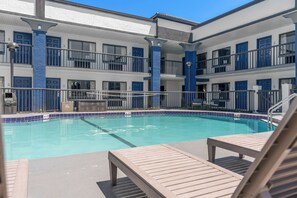 Outdoor pool, open 8:00 AM to 7:00 PM, pool umbrellas, sun loungers