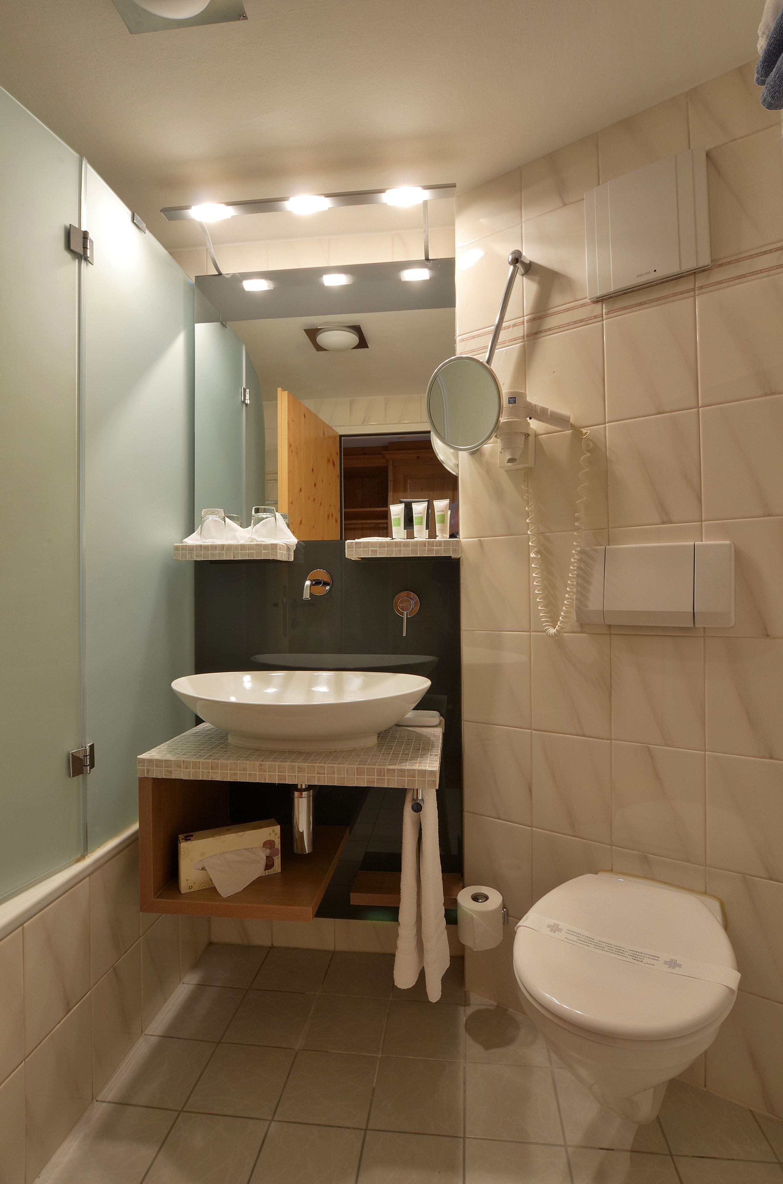 deep-soaking bathtub, free toiletries, hair dryer, bathrobes